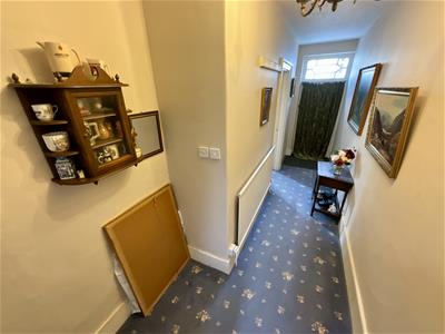STEPS UP TO FRONT FRONT HALLWAY